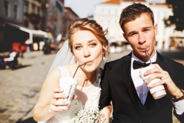 young luxury gorgeous happy bride and groom on the background of sunny city young luxury gorgeous happy bride and groom on the background of