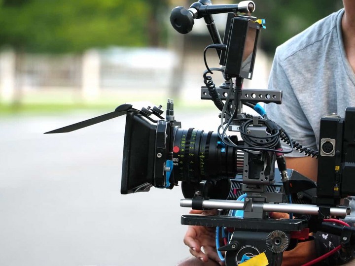 Behind the scenes of movie shooting or video production.