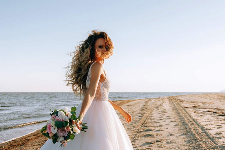 happy bride by the sea